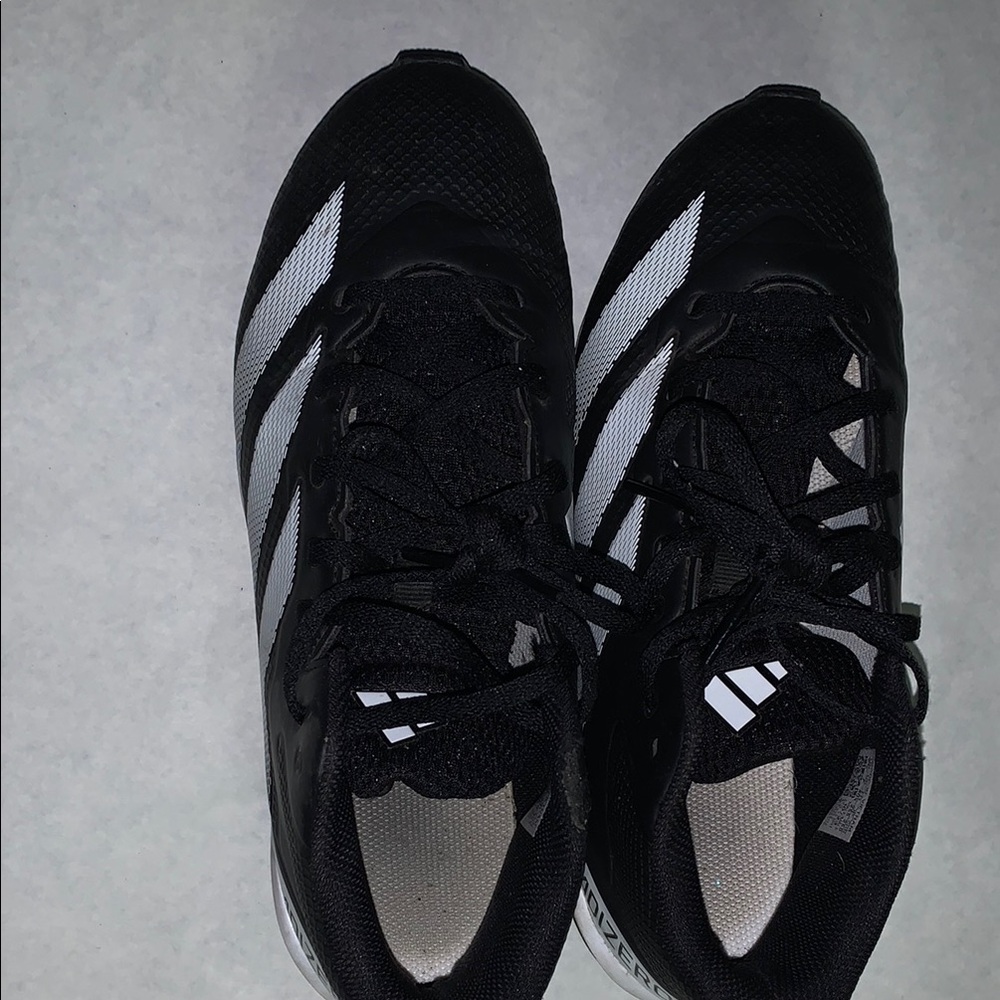 Adidas Black Sneakers with Classic Stripes and Padded Comfort